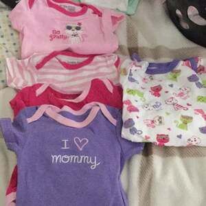 Bundle of 5 onsies in pinks and lavenders 6-9